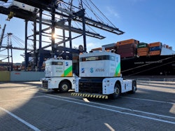 Two small lorries in shipping port